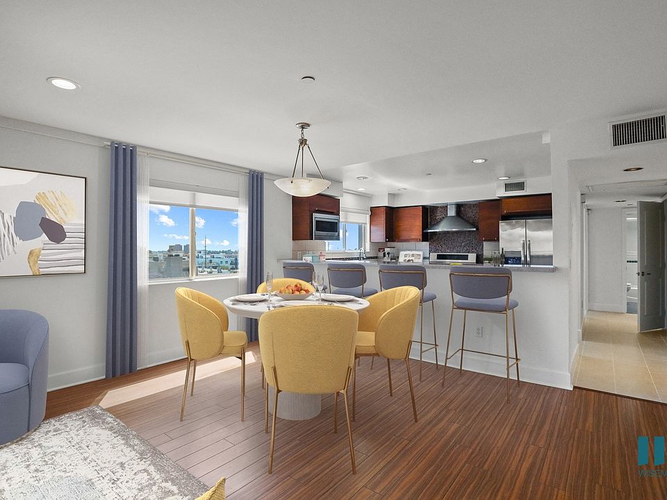 Open-Concept Kitchen and Dining Space with Countertop Bar