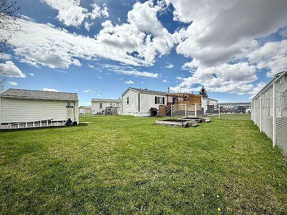 4th image of 103 Clark Crescent Rural Grande Pr #1