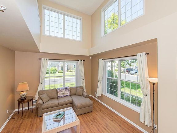 Many large windows allows natural light to fill the generous living spaces! Remote blinds give shade or privacy when needed.
