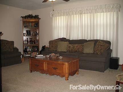 Up living room
						:
						Very large space with new ceiling fan. All window treatments stay.