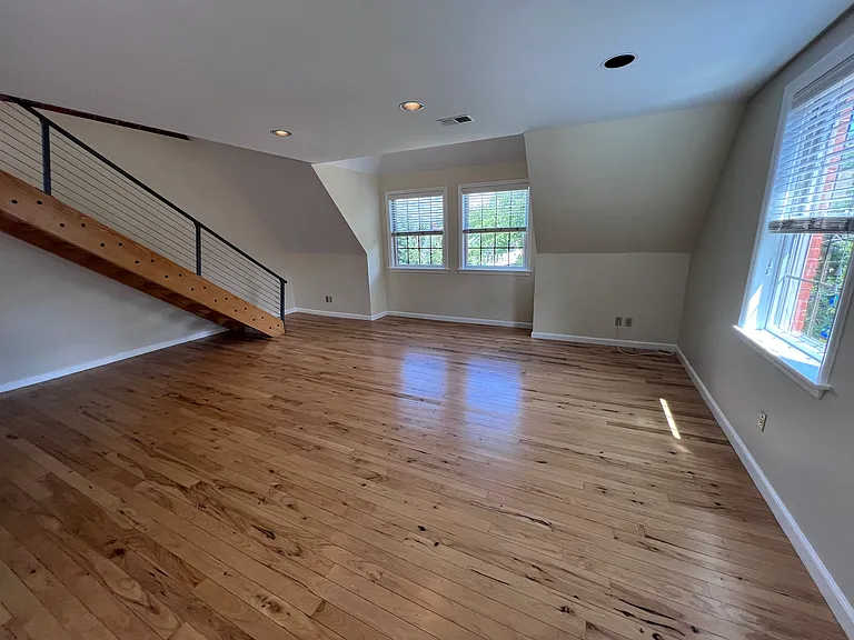Dining area and living room, tons of natural light. West facing windows get morning sun.