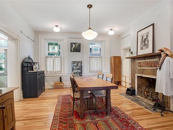 Formal dining room with fireplace