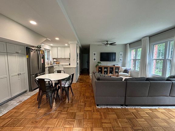 View of living room and kitchen from front door