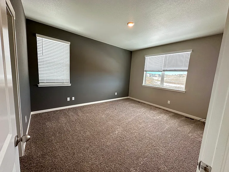 Master bedroom with an open space view