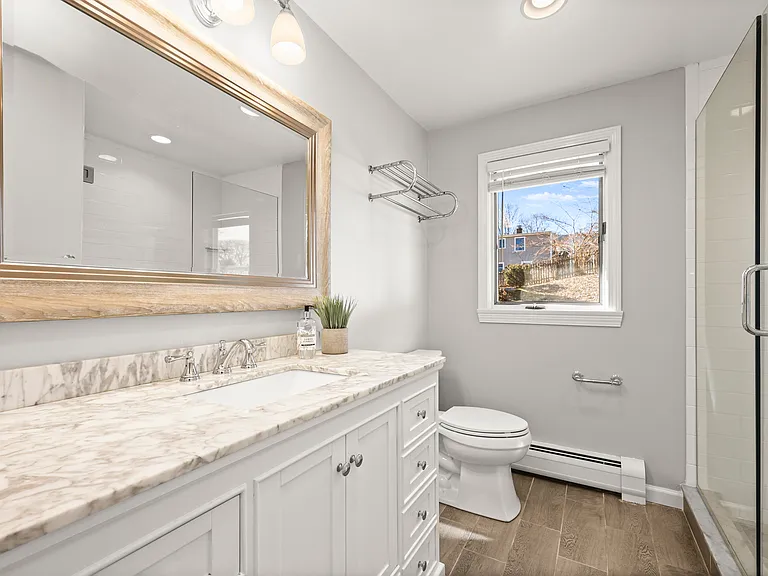 First floor full bathroom with walk-in shower.