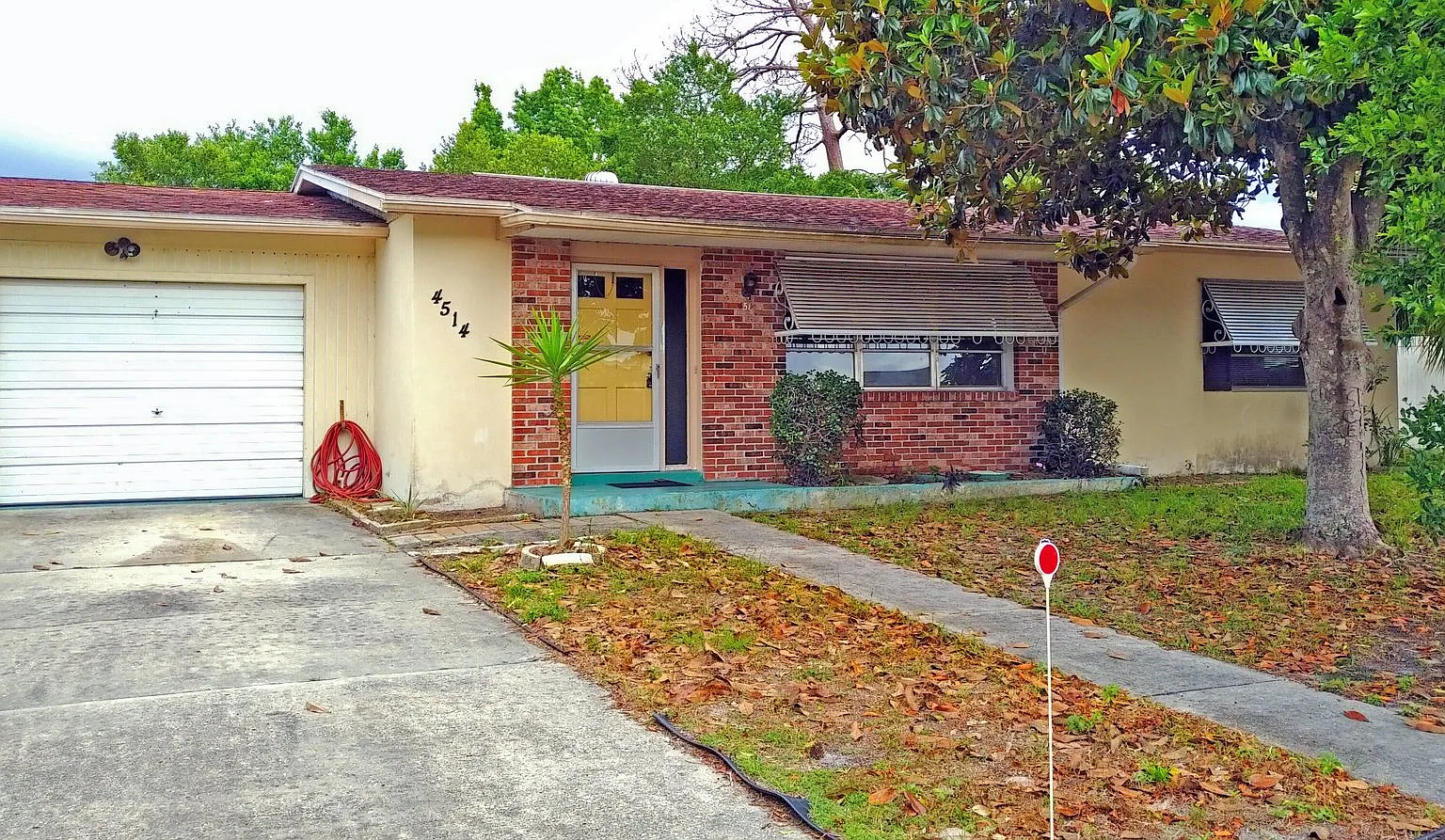 Spacious 2/2 home featuring neutral ceramic tile throughout within the heart of Spring Hill — Photo 2