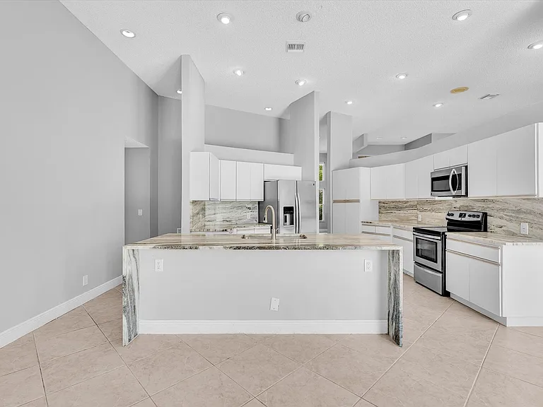 10434 NW 6th Ct — Photo 38