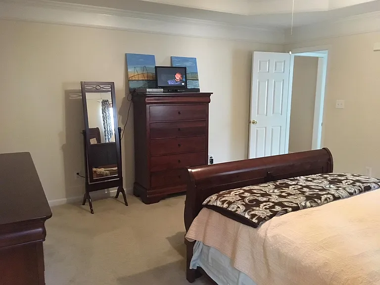 Master bedroom showing view taken from double windows