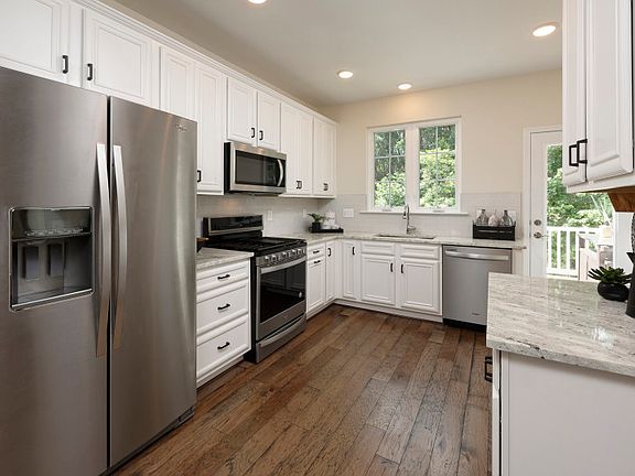 Kitchen with Granite Countertops and Stainless Steel Appliances