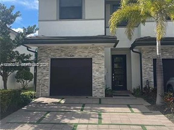 2nd image of 15846 NW 91st Ct #Townhouse 15846