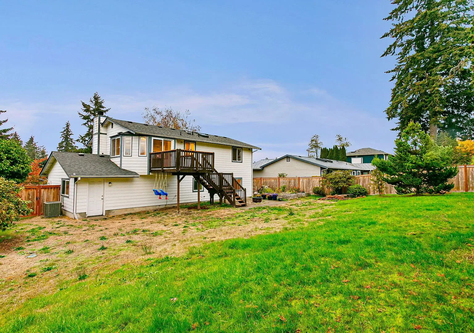 Updated 4-Bedroom Home with Deck & Two-Car Garage — Photo 2