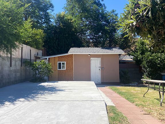 Two storage sheds in backyard. Both have electricity to use as storage or workshop.