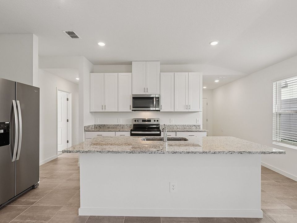 The Kitchen at 7476 Queensgate Cir