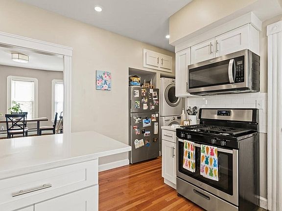 kitchen with gas stove, in-unit laundry