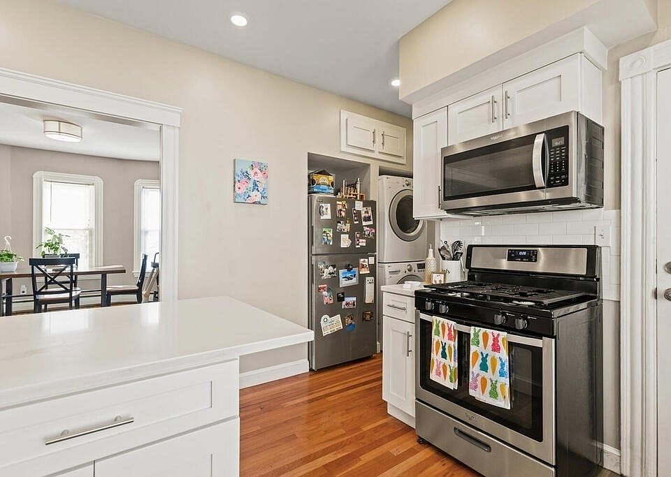 kitchen with gas stove, in-unit laundry