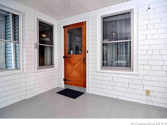 ENCLOSED FRONT PORCH