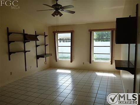 Family Room, tile floor and plenty of natural light.