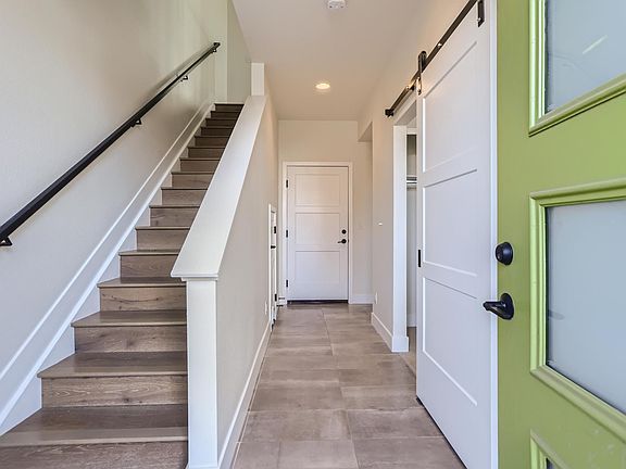 Entry way - main level bedroom and private bathroom to the right