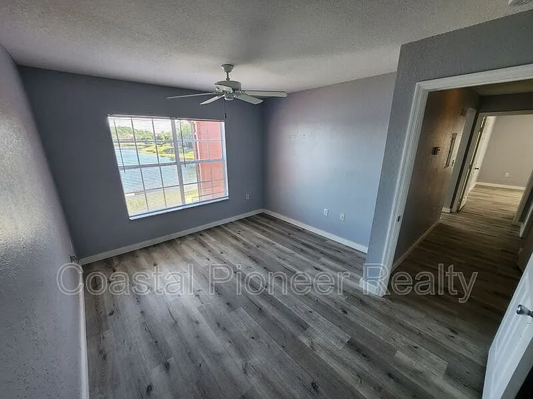 9232 Lake Chase Island Way — Photo 26