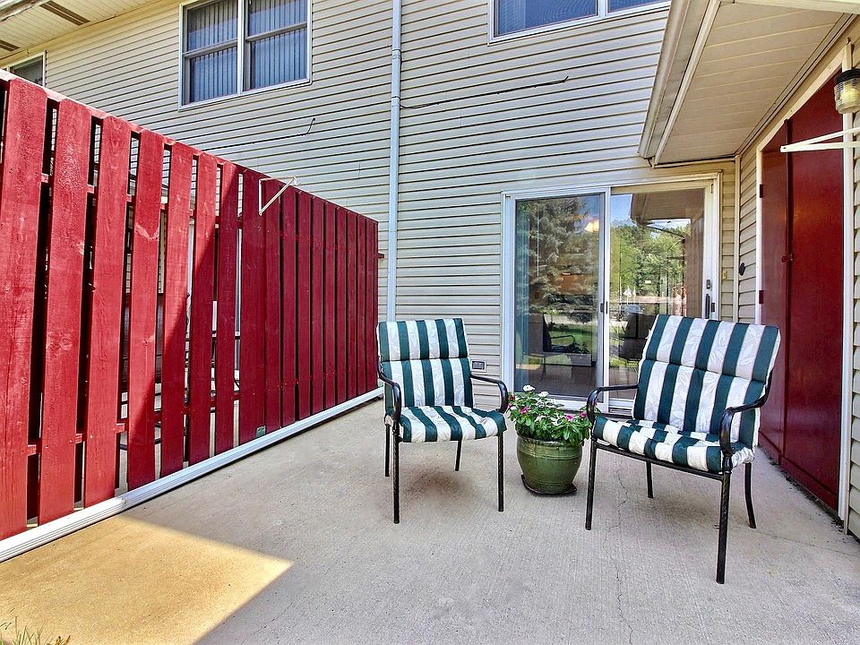 Private spacious patio with extra storage shed