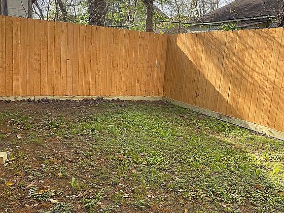 Backyard view fully fenced 