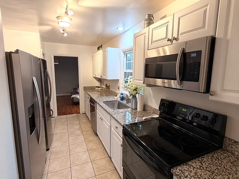Shared kitchen with two full size refrigerators
