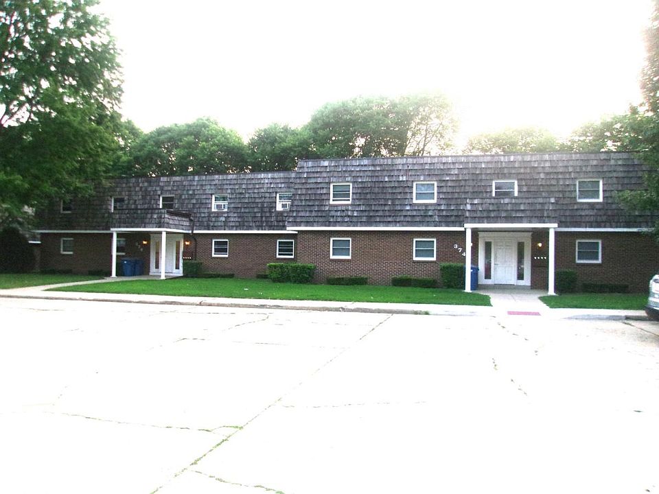 Front of building off Private road with assigned 2 parking spaces.