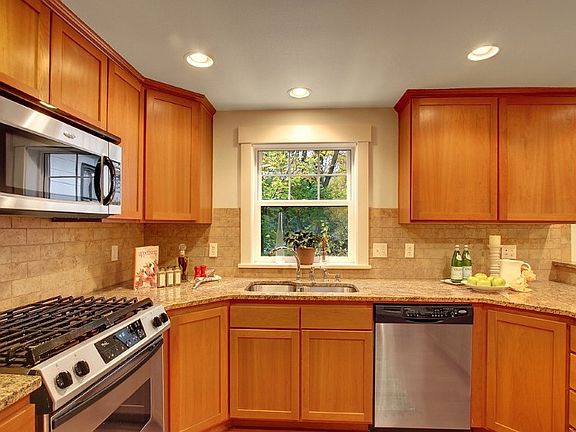 Cooks love this kitchen with gas stove and plenty of counter and cabinet space.