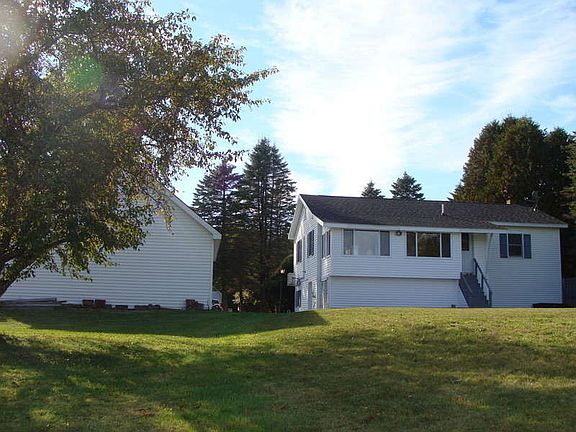 Backyard
						:
						View of back of house and garage