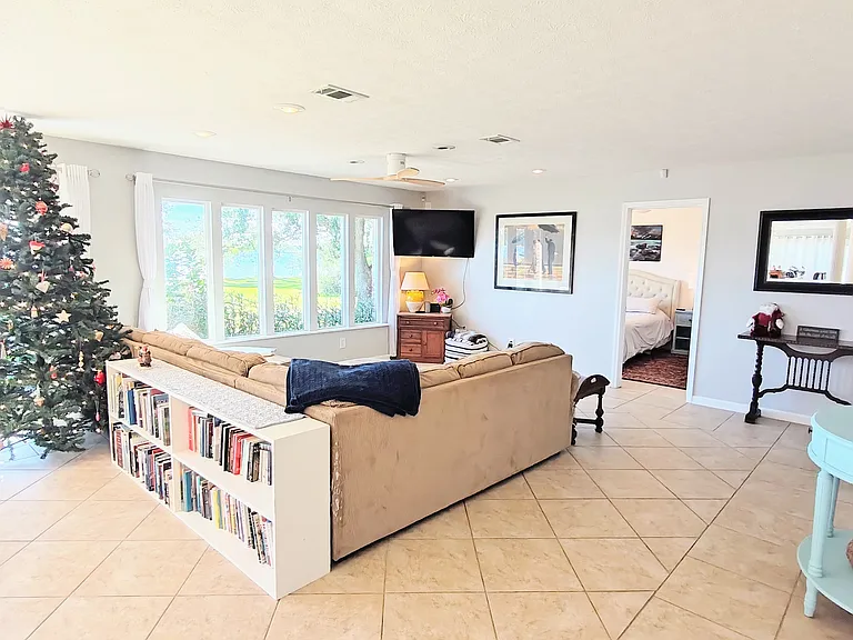 Living area with front bedroom beyond.