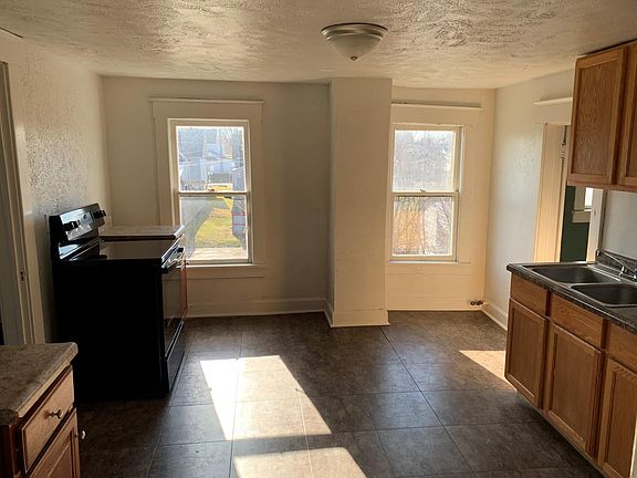 Kitchen has 2 windows for natural light