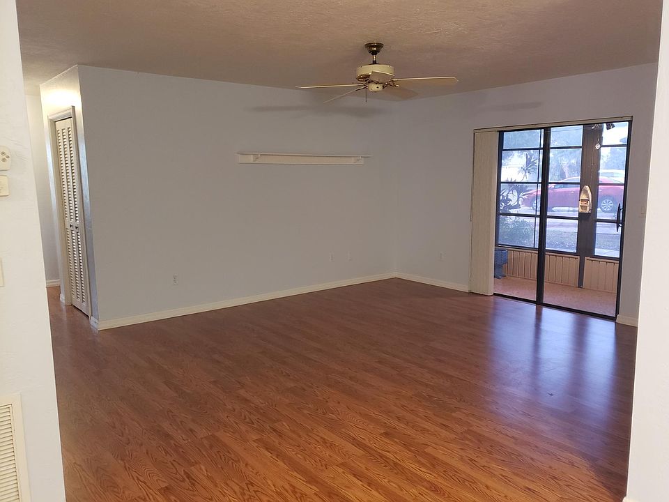 Living Room with sliders to back oporch