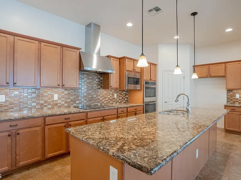 Chef kitchen available for use as well with array of dishes.