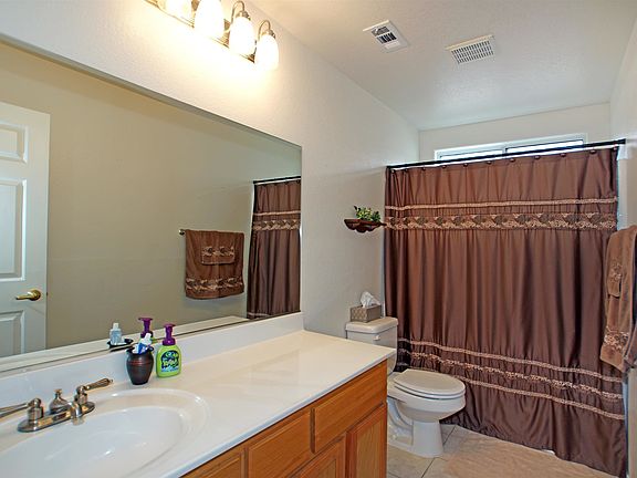 4th image of 8801 Frasure Falls Ave