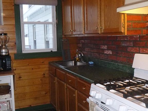 Kitchen with all new appliances. Stove is gas with 5 burners.