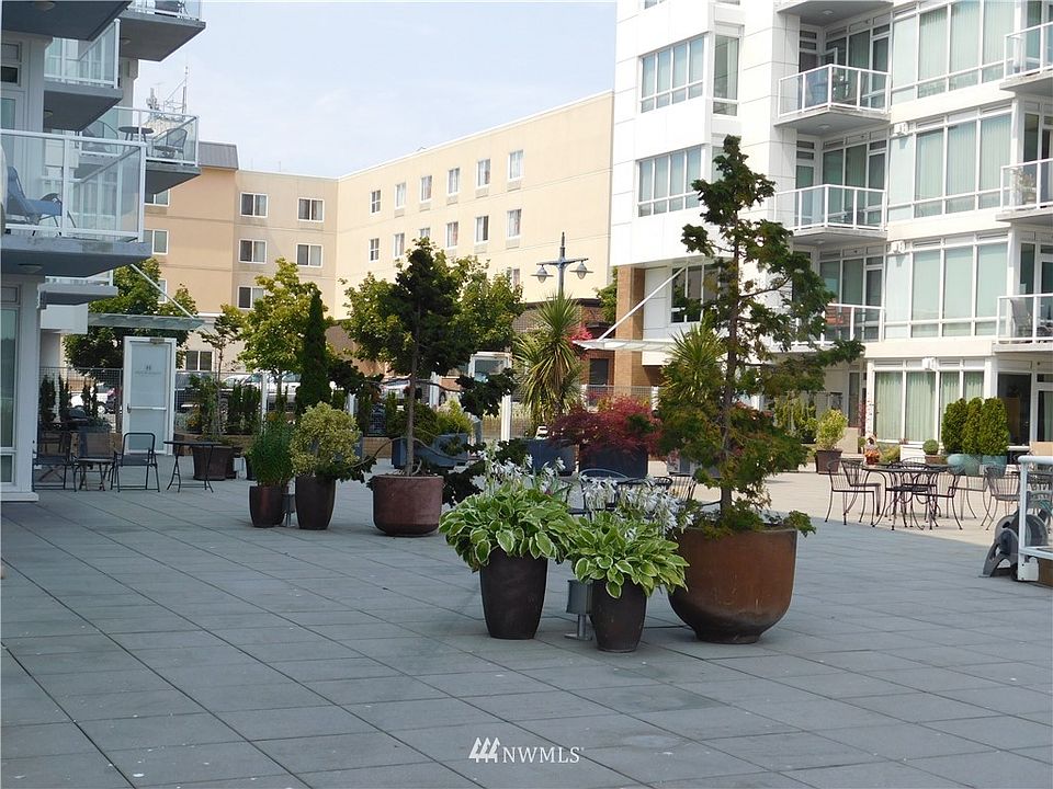 This photo shows the lovely common patio area to the north of the condo.  The patio can be viewed through the floor to ceiling windows on the north side of the condo.  The first 10 feet from the outside wall of the condo is for the personal use of the condo owner.  There is also a lovely patio on the east side which opens from a door in the living roon which is also for the exclusive use of the owner.