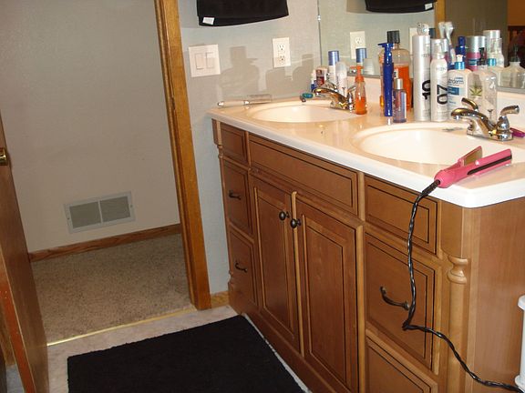 Double Sink with TONS of storage in bathroom