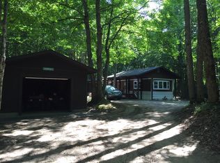 8668 Whispering Pines Dr, Mancelona, MI 49659