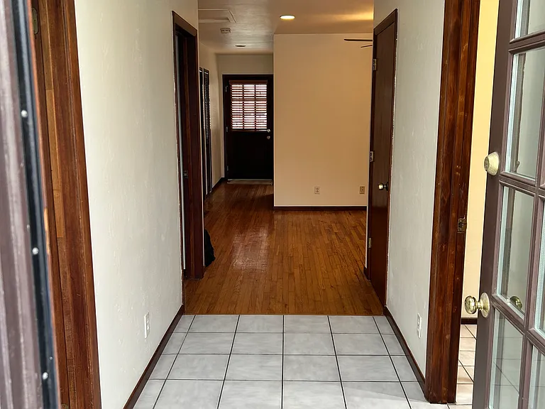 hallway from rear entrance to front door