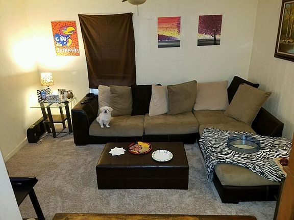 Attached garage that has been converted into additional livi