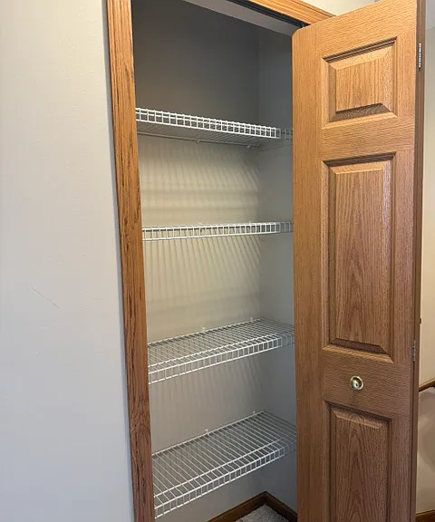 LINEN CLOSET IN UPPER LEVEL HALLWAY