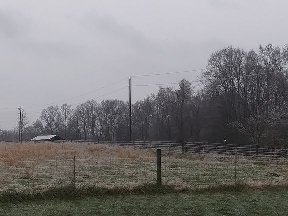 top of barn in pasture