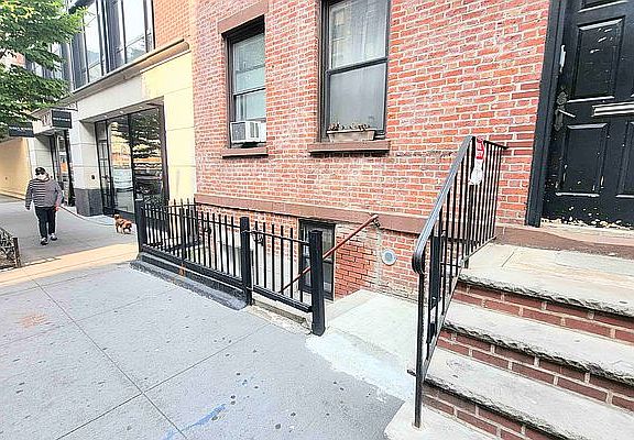 4th image of 201 Mott St APT A
