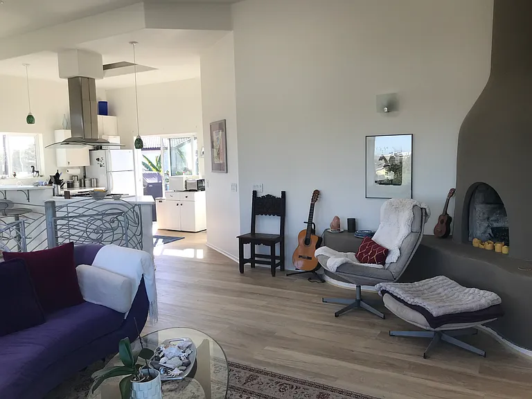 The kitchen is open to the living room and dining area.