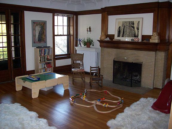 Spacious Living Room with Decorative Fireplace