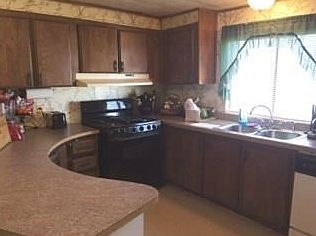 Bright Kitchen with Breakfast Bar, Open to Living Room