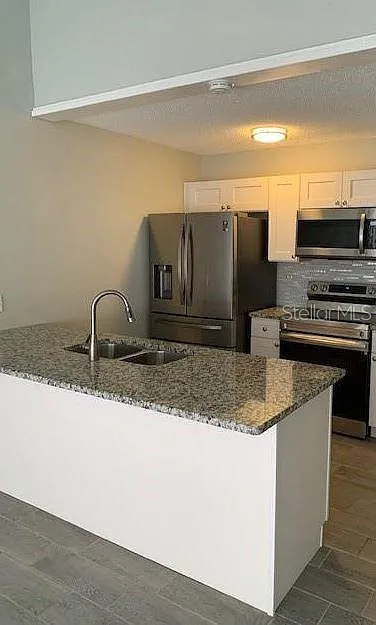 Building Photo - 6020 Peregrine Ave #20B