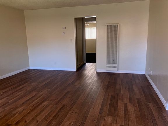 living room and hall with new wood flooring