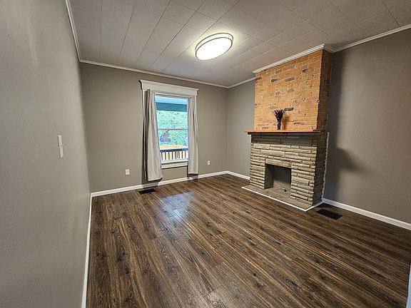 Living room which could be a 4th bedroom/office space/flex room!