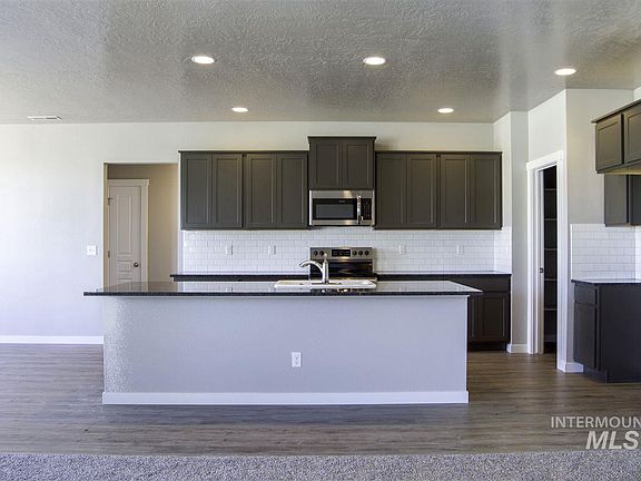 5th image of 9682 W Roan Meadows Dr